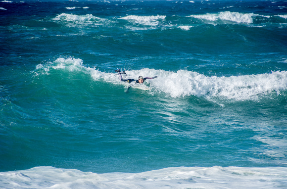 Surfer in Waves